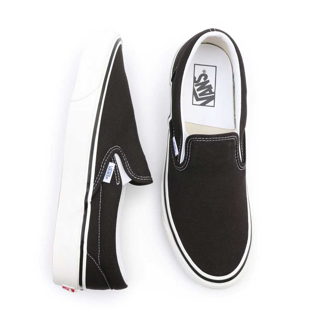 Black slip on vans for girls best sale