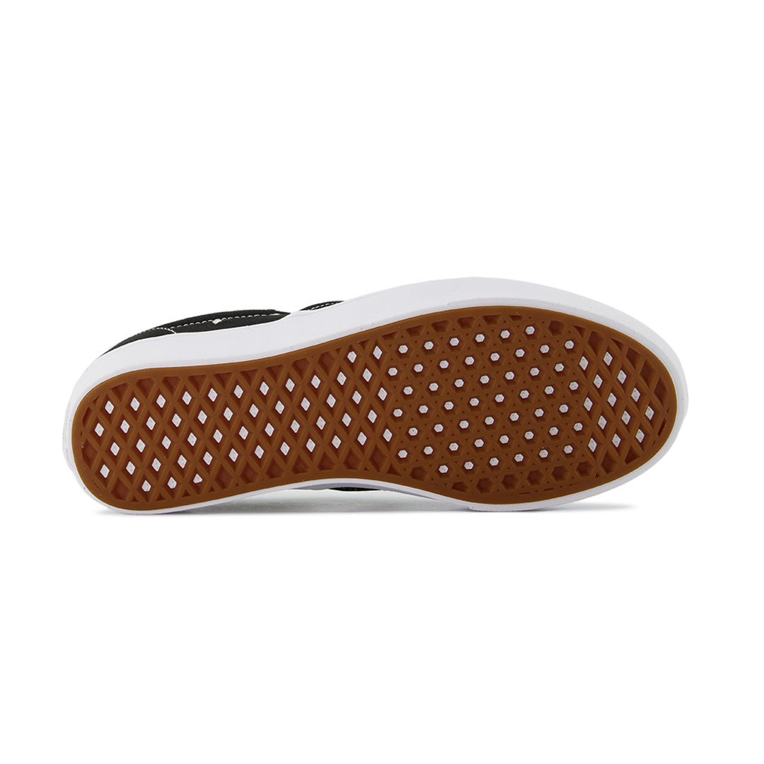 Black slip on vans brown sole best sale