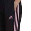 adidas - Pantalon Essentials Warm-Up Slim Tapered à 3 bandes pour femme (HP0461) 